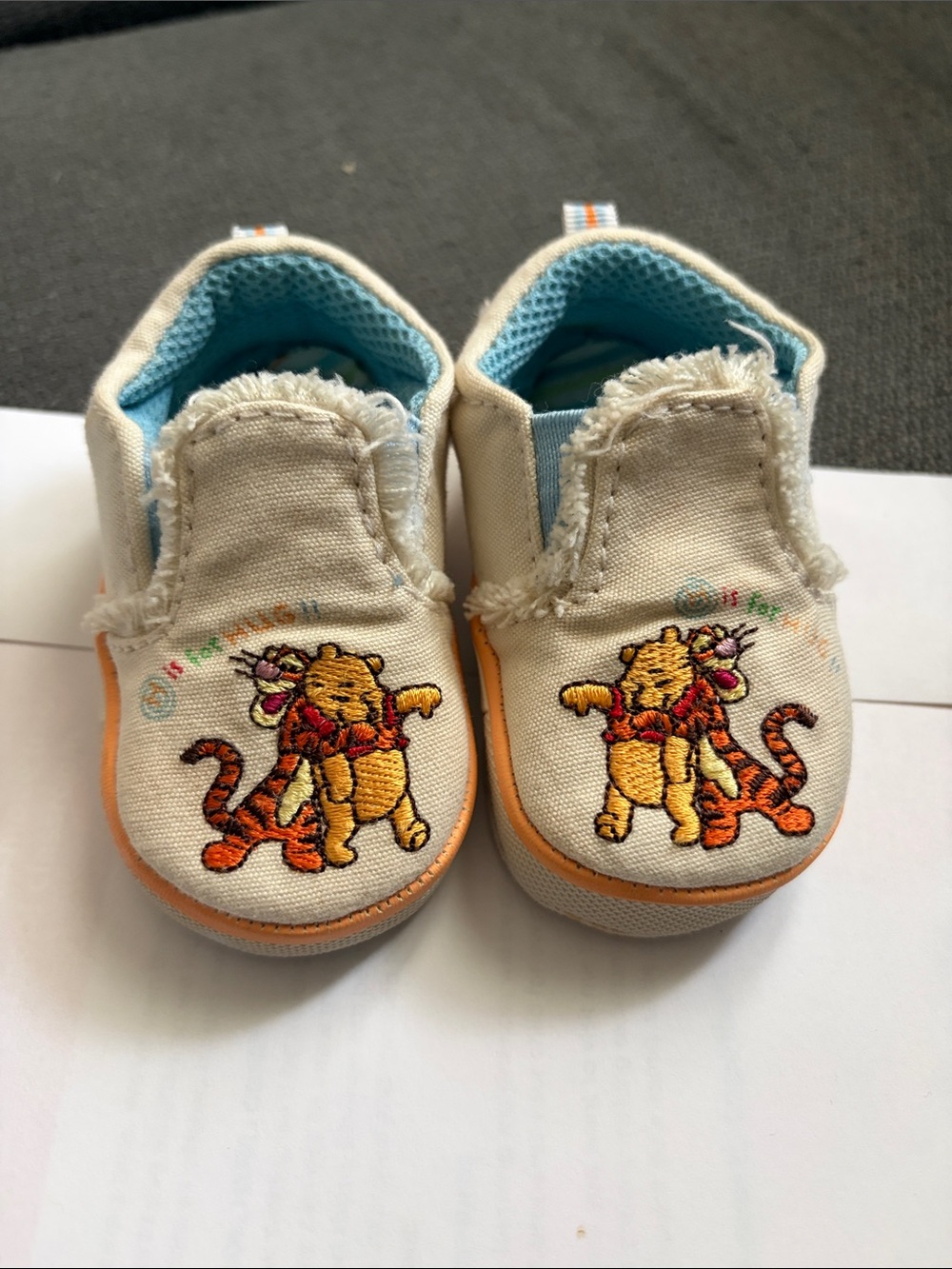 Disney Cream Canvas Slip-On Baby Shoes with Orange Trim and Tiger Embroidery